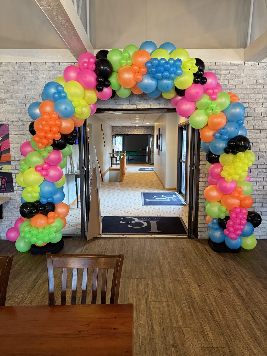 Full colorful organic balloon archway